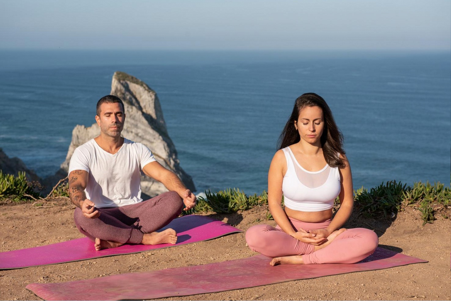 Professional practising structured breathing technique at a workstation