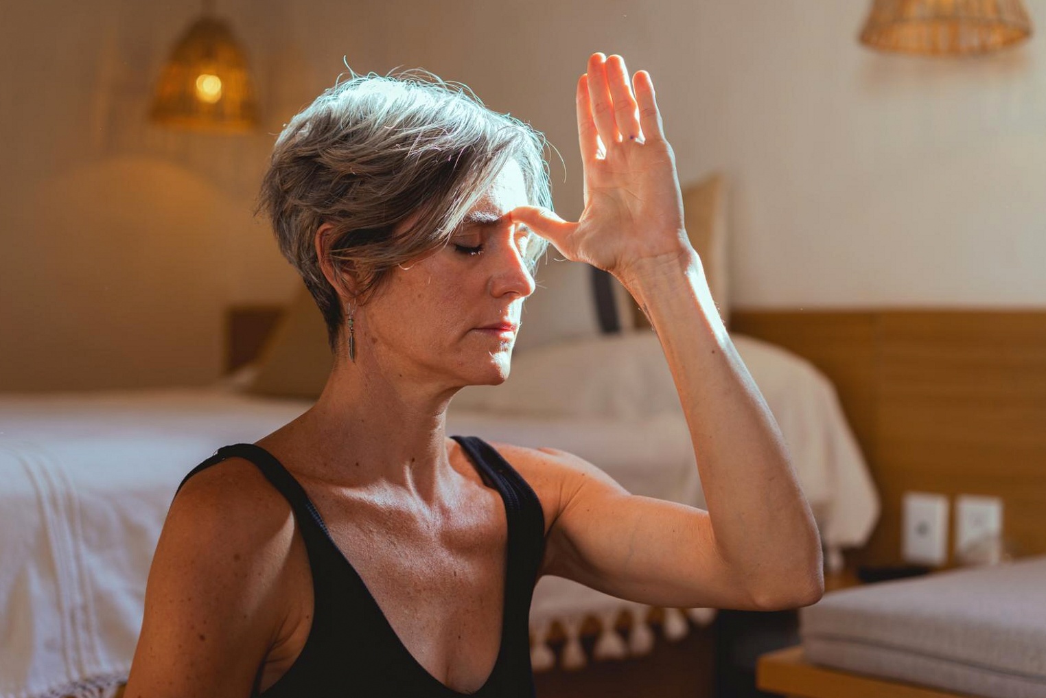 Practitioner guiding a meditation session focused on anxiety regulation